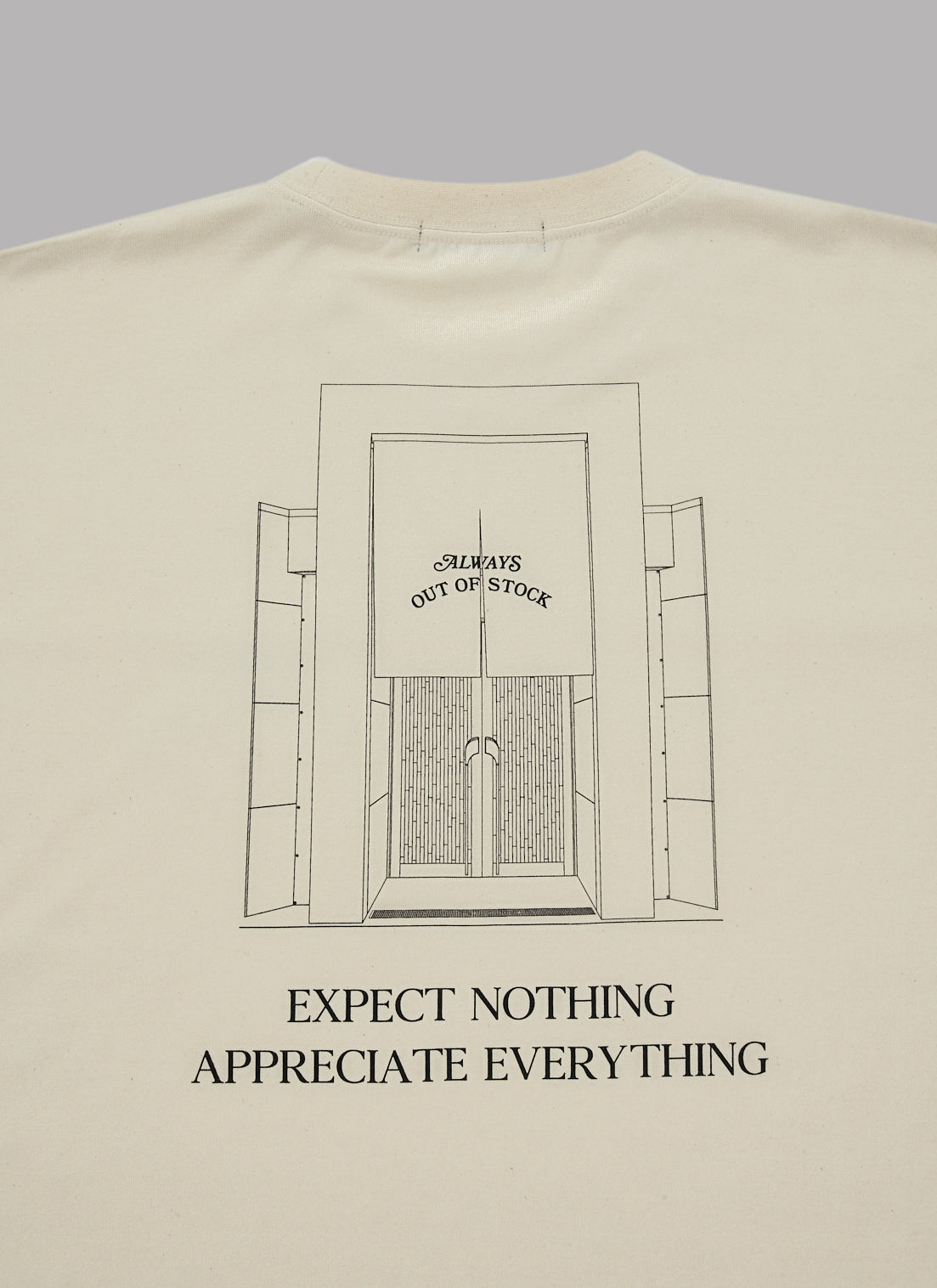 STORE GRAPHIC L/S TEE-IVORY