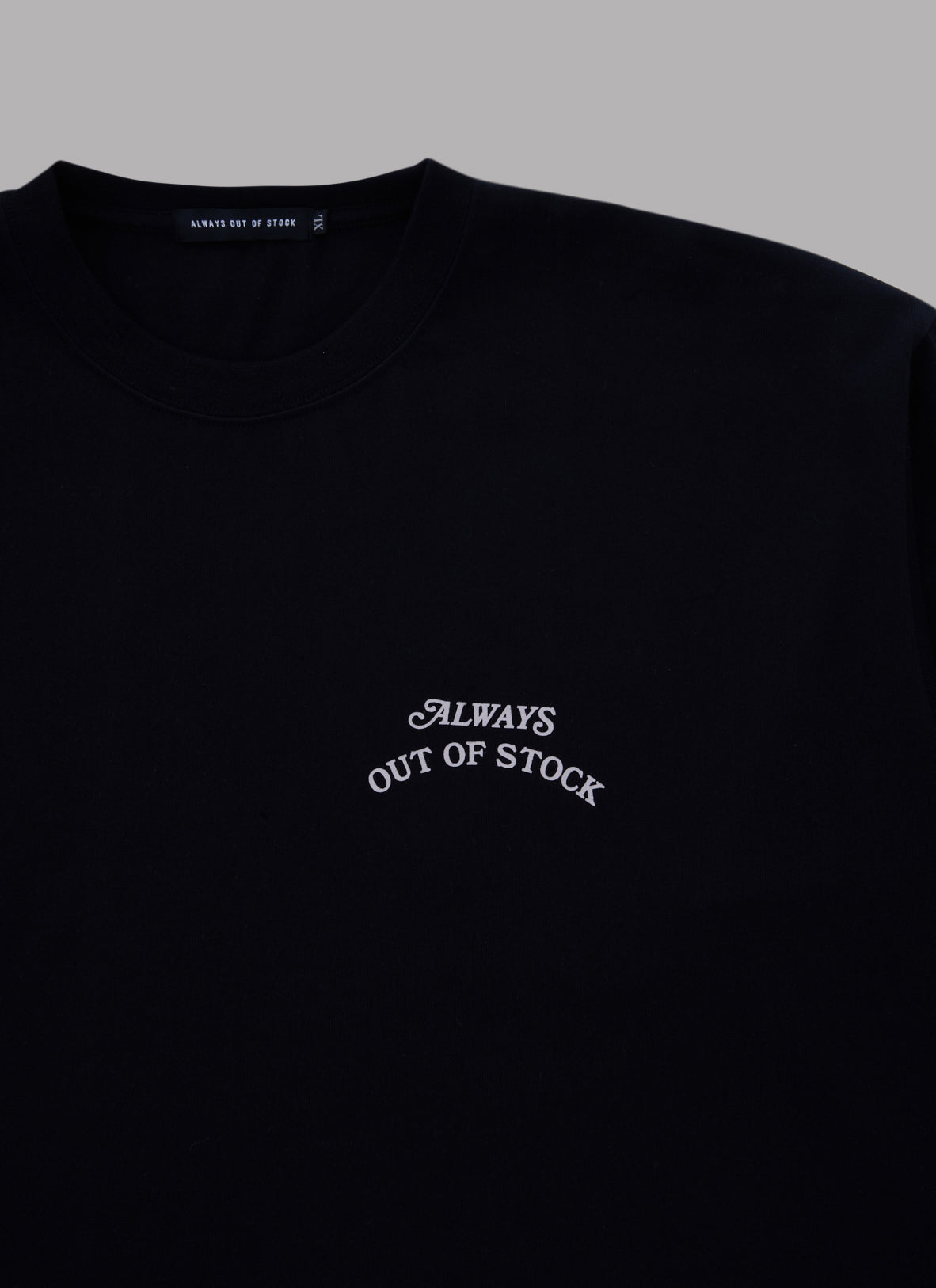 IT'S ONLY A SHORT TRIP L/S TEE-BLACK