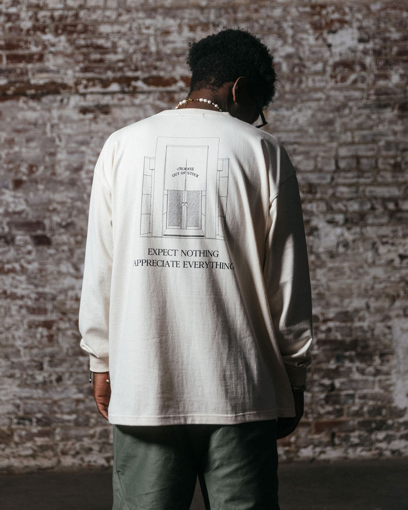STORE GRAPHIC L/S TEE-IVORY